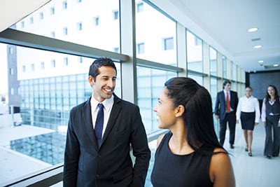 Employee and manager walking