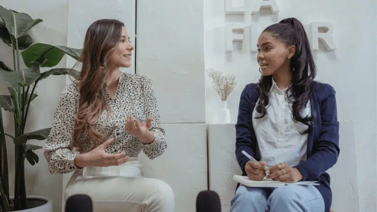 Two women chatting