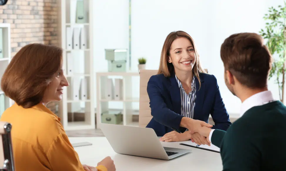 business meeting with man and two women