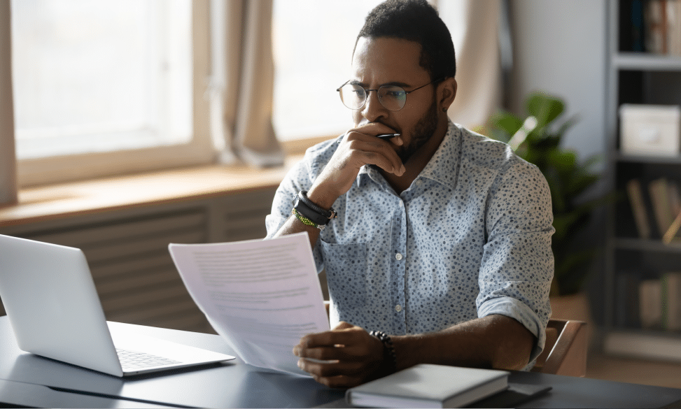 man writing resignation letter